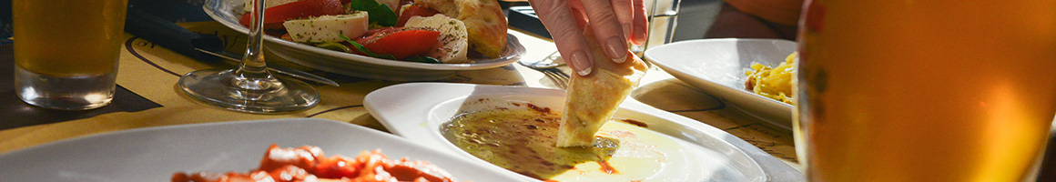 Eating Food Stand Venezuelan at Arepa Latin Street Food restaurant in Olympia, WA.